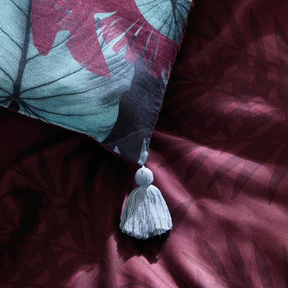 dredon_avec_glands_tanzan_1.webp Édredon avec glands Tanzanie Prune - 140 x 200 cm*CXLbyChristianLacroix Clearance