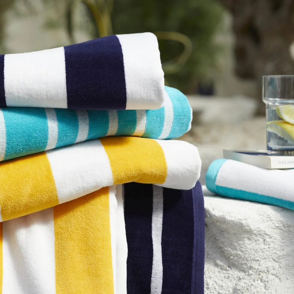 serviette_de_plage_consta_1.webp Serviette de plage Constance Turquoise - 90 x 180 cm*CXLbyChristianLacroix Outlet